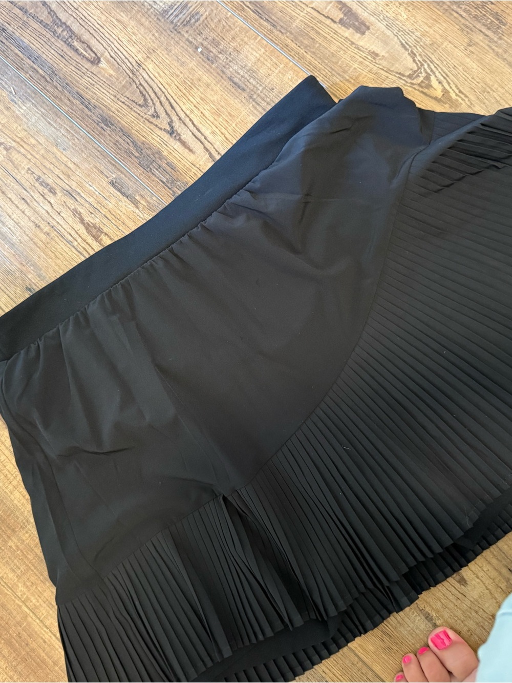 SPANX Black Mini Skirt with Pleated Hem